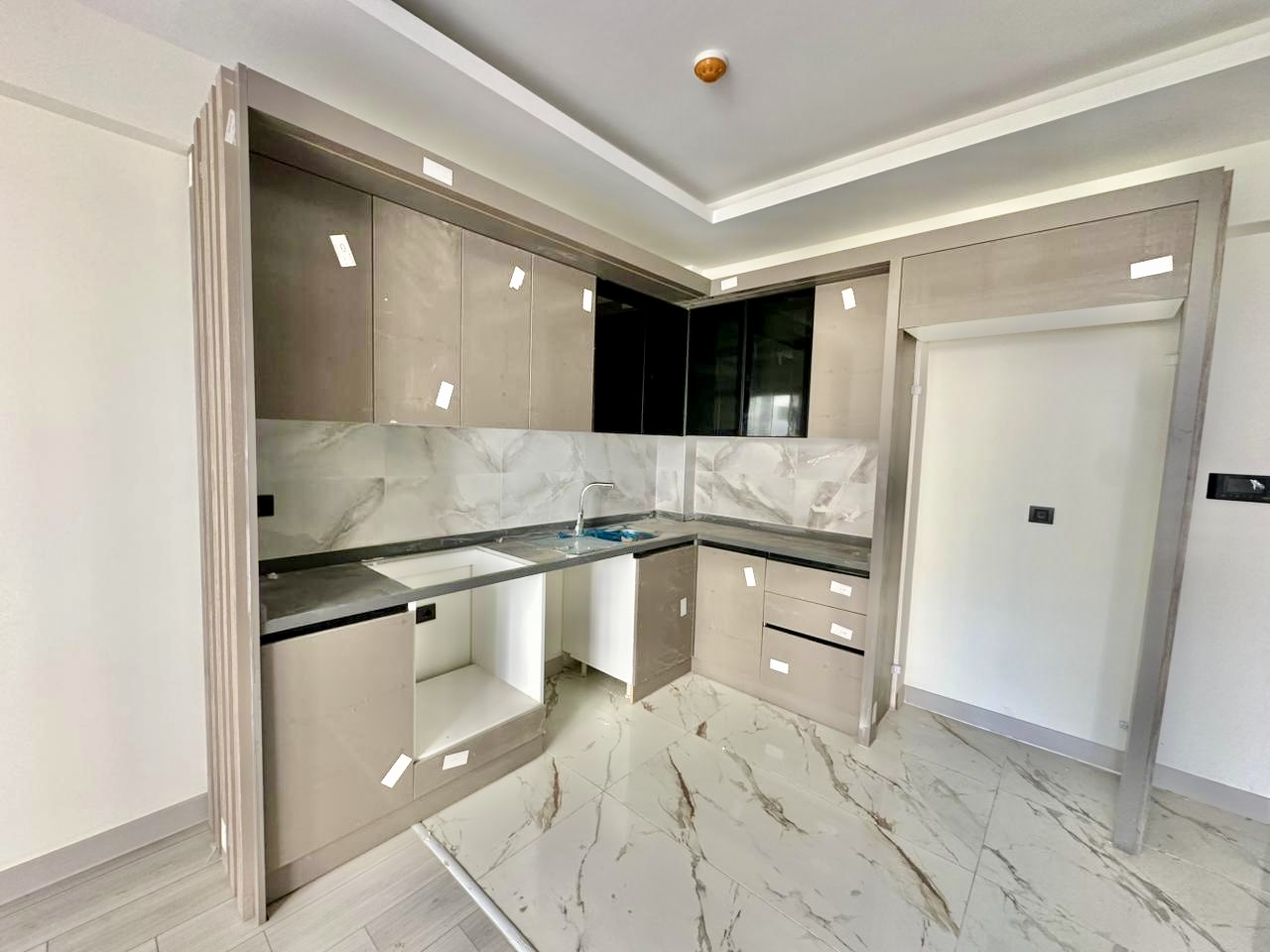 Новая квартира 1+1 в Мерсине, Томюк - Ex225077