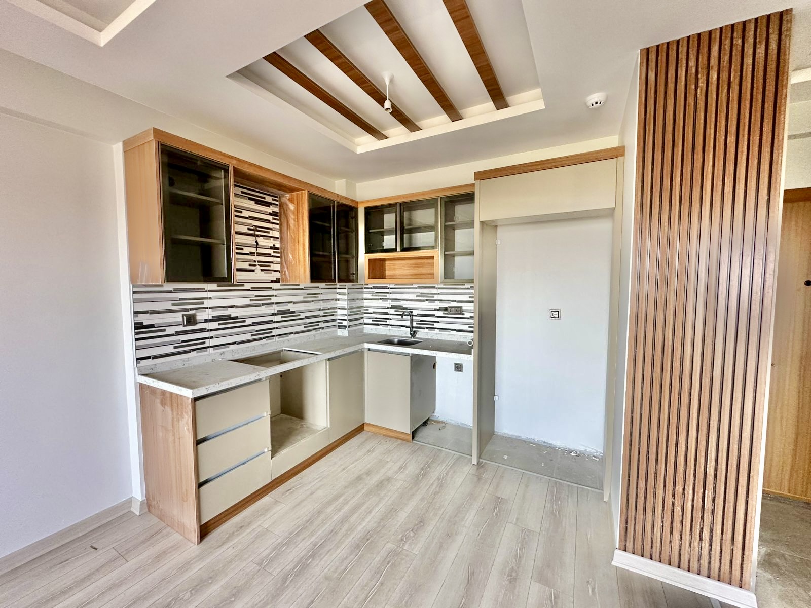 Квартира 1+1 в новом комплексе в Мерсине, Томюк - Ex240755