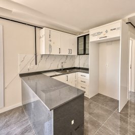 1+1 apartment in a new complex in Mersin, Mezitli - Aa407011 - photo 32