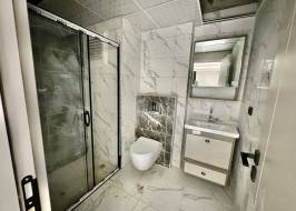 New 1+1 apartment by the sea in Mersin, Tomük - Ex240077 - photo 35