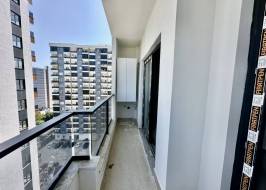 Новая квартира 1+1 у моря в Мерсине, Томюк - Ex240784 &mdash; фото 32