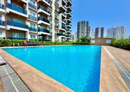 Квартира 1+1 в новом доме рядом у моря в Мерсине, Тедже - Aa4204901 &mdash; фото 45