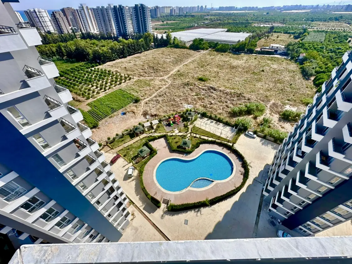 1+1 apartment with sea and pool view in Tece , Mersin - Ibr401365