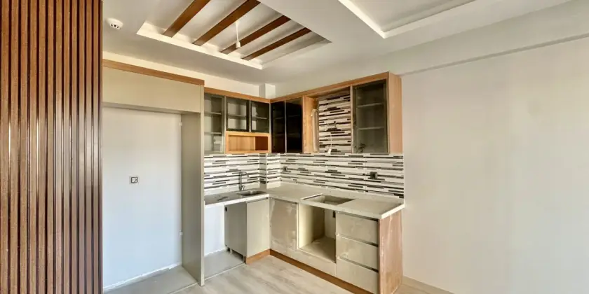 Квартира 1+1 в новом комплексе в Мерсине, Томюк - Ex235756