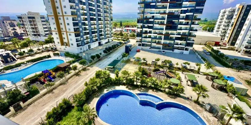 Квартира 1+1 в новом доме у моря в Мерсине, Томюк - Ex2250519