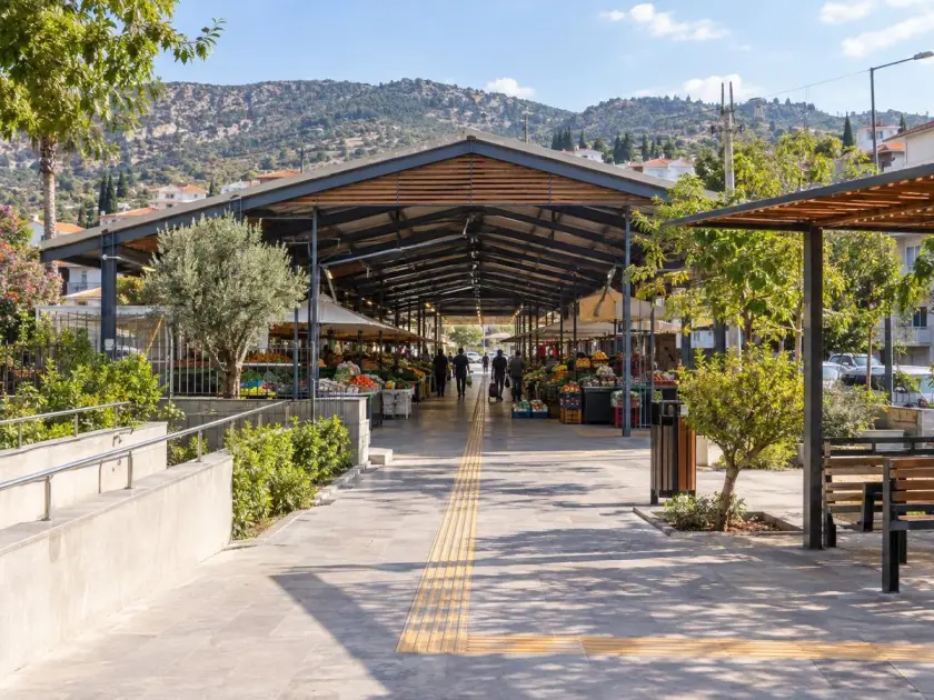 An accessible indoor market with a wide aisle and tactile path is the theme of everyday accessibility in Yenişehir