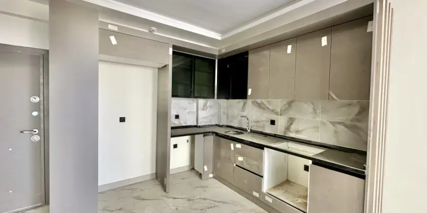Новая квартира 1+1 у моря в Мерсине, Томюк - Ex240784