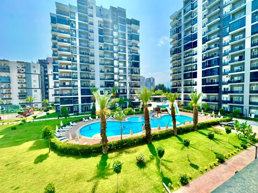 Новая квартира 1+1 в комплексе рядом с морем в Тедже, Мерсин - Aa511154