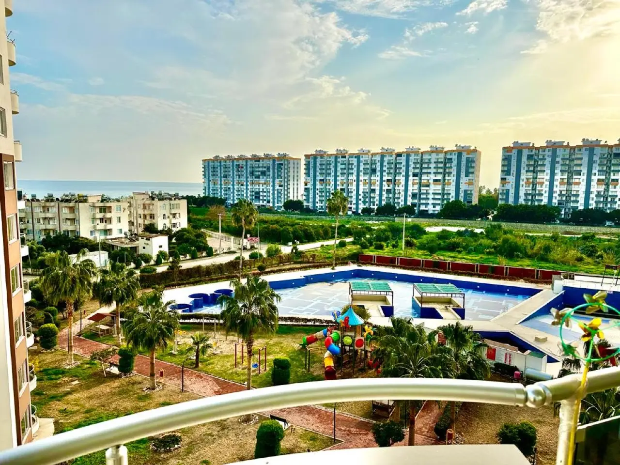 Apartment 1+1 with furniture on the first line, Cesmeli, Mersin - ALSF11