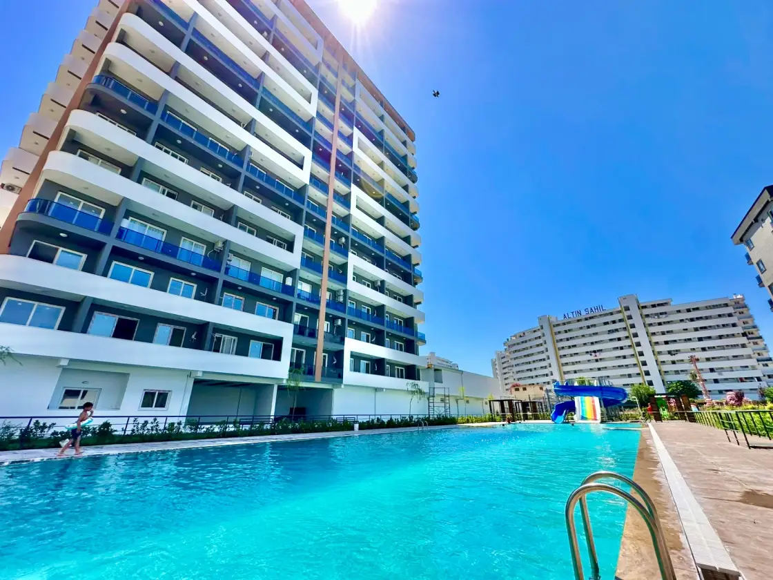 1+1-Apartment in einem Neubaukomplex in Tomük, Mersin - AS400651