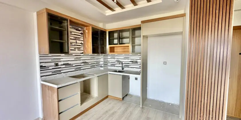 Квартира 1+1 в новом комплексе в Мерсине, Томюк - Ex240755