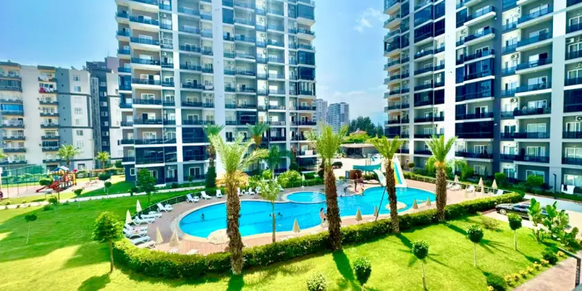 Новая квартира 1+1 в комплексе рядом с морем в Тедже, Мерсин - Aa511154