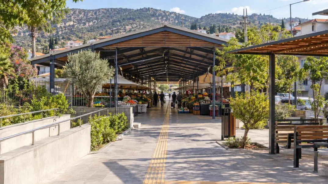 An accessible indoor market with a wide aisle and tactile path is the theme of everyday accessibility in Yenişehir